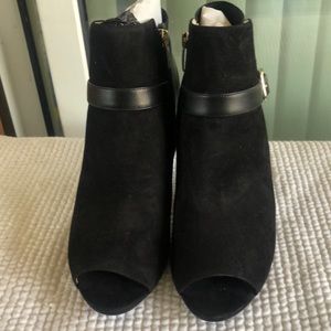 Marc Fisher black open toed booties with leather trim.
